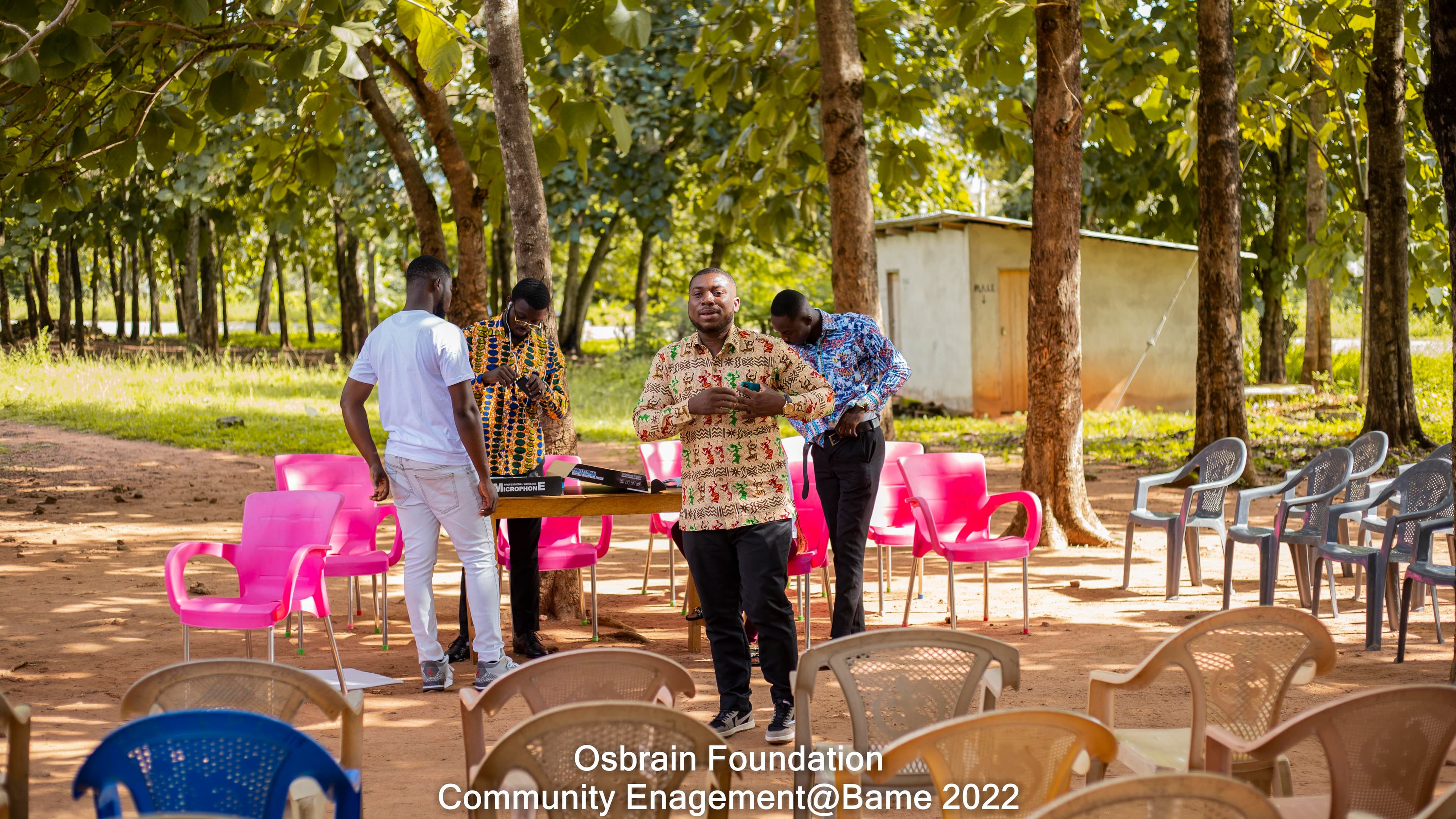 Somnia Osbrain Foundation community engagement meeting under trees